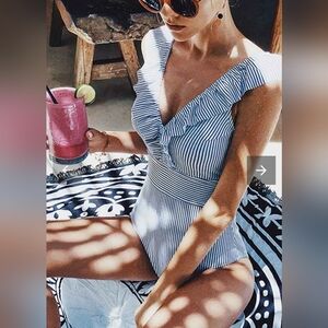 NWOT Blue and White striped bathing suit. Size XL